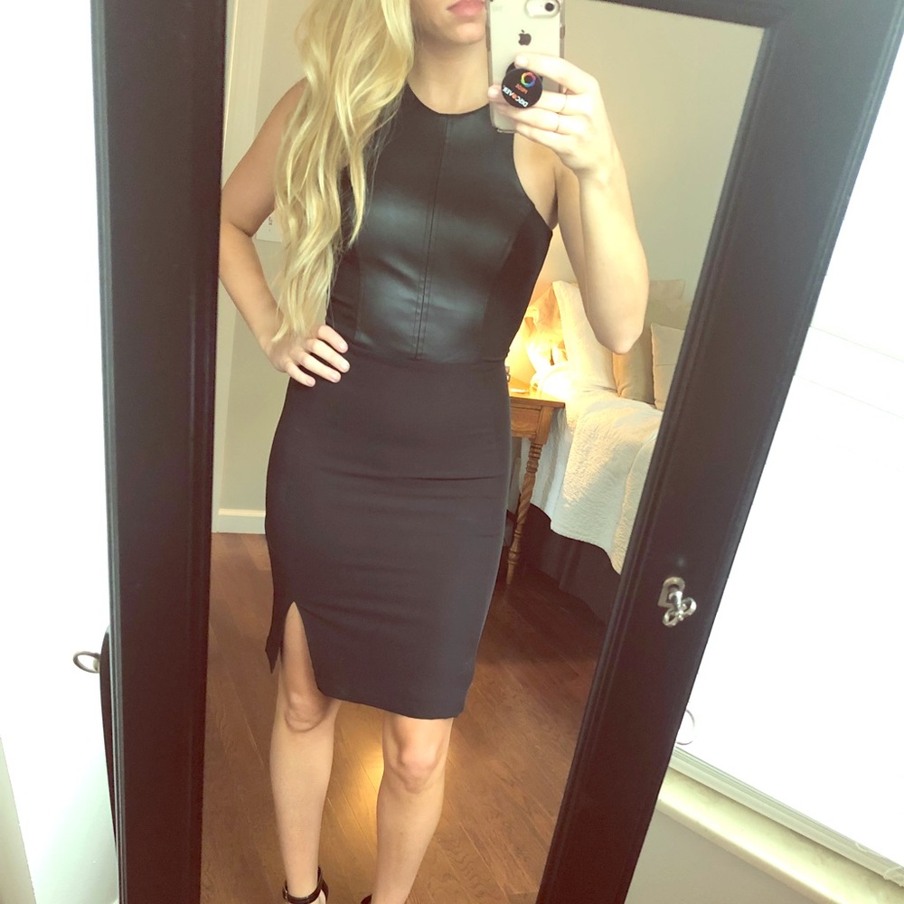 Black dress with leather (faux) detail.